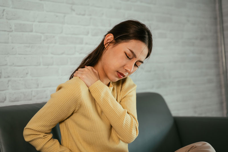 woman suffering from shoulder pain